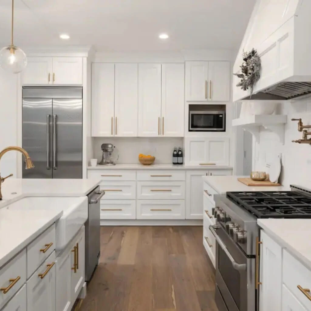 Modern white kitchen remodel with shaker cabinets and stainless appliances by Prime Cut Construction remodeling contractor